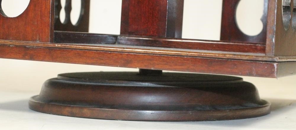 A MAHOGANY TABLE TOP REVOLVING BOOKCASE Image