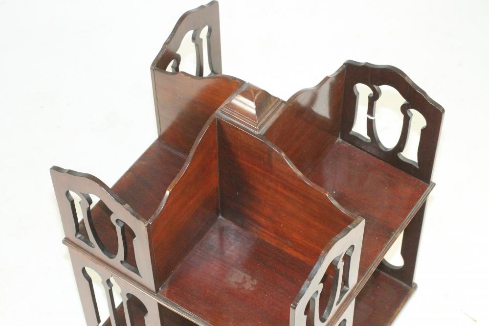 A MAHOGANY TABLE TOP REVOLVING BOOKCASE Image