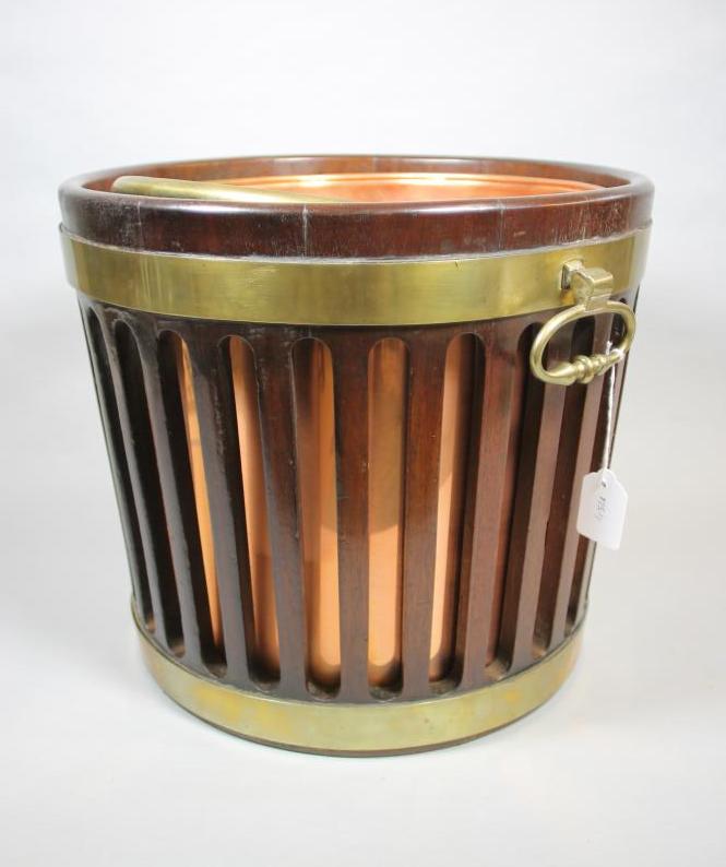 A GEORGIAN MAHOGANY BRASS BOUND PLATE BUCKET Image
