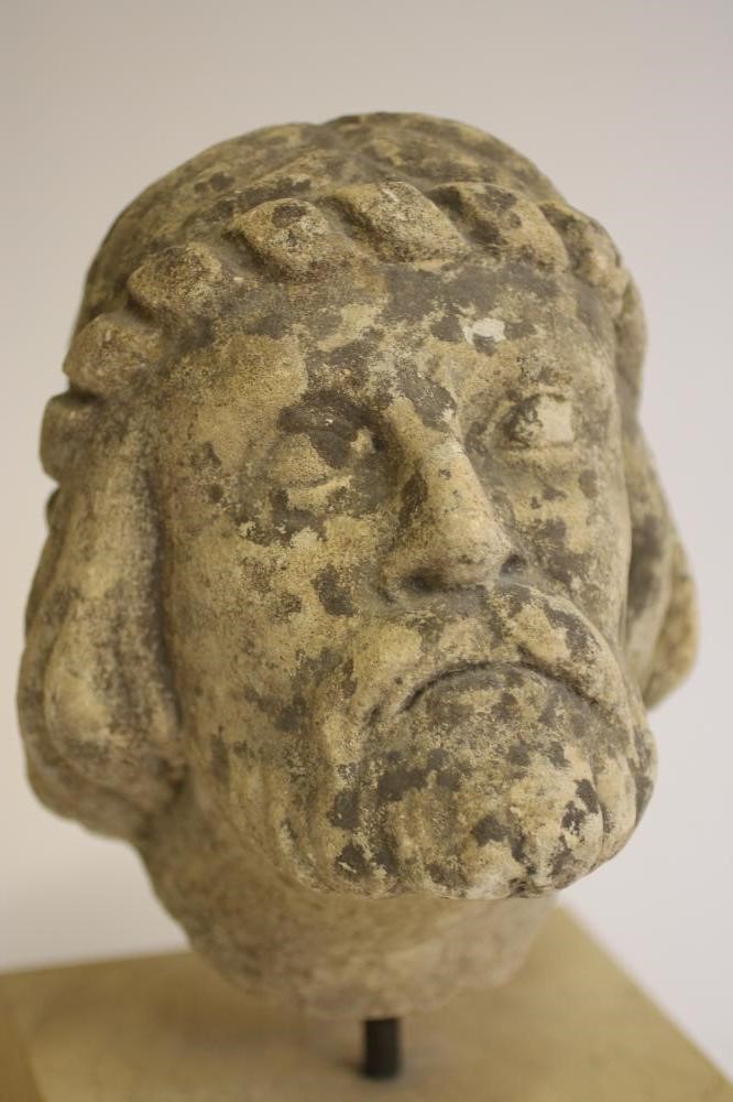 A CARVED OOLITIC LIMESTONE BUST Image