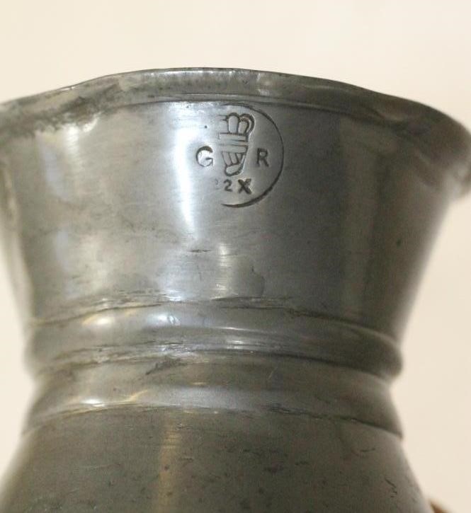 A SET OF FOUR IRISH PEWTER MEASURES Image