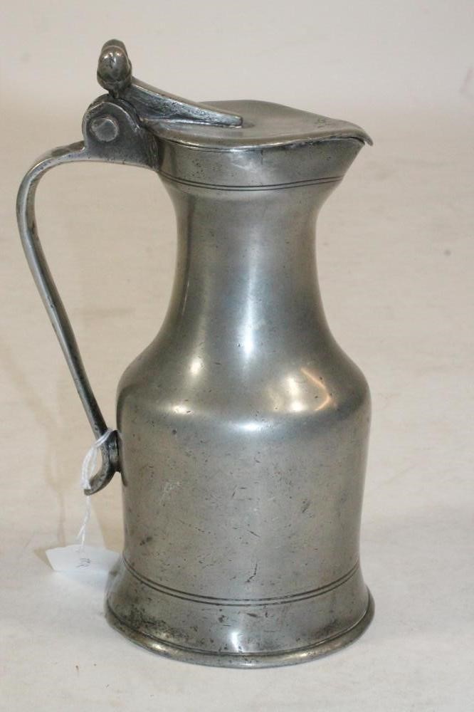A FRENCH PEWTER WINE MEASURE Image