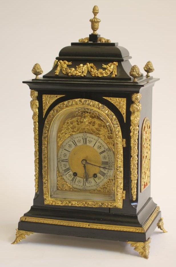 AN EBONIZED AND GILT METAL MOUNTED TABLE CLOCK of Georgian design Image