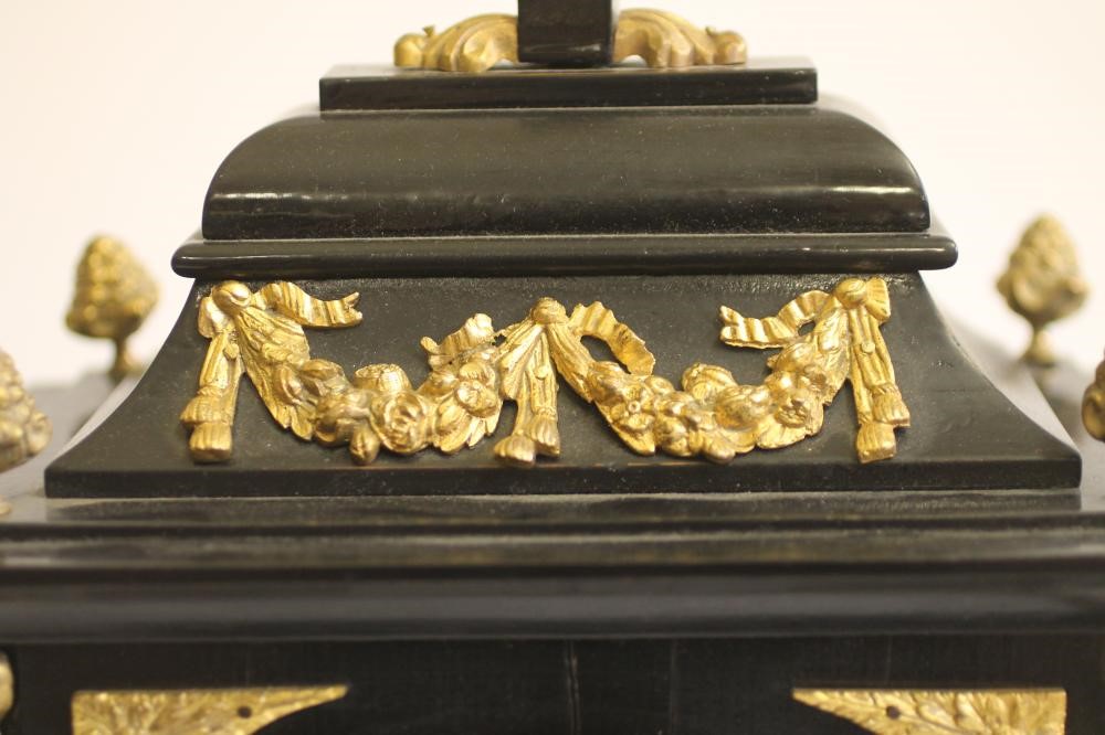 AN EBONIZED AND GILT METAL MOUNTED TABLE CLOCK of Georgian design Image