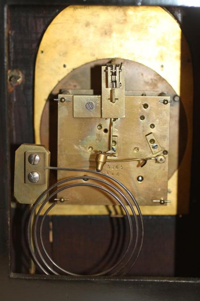 AN EBONIZED AND GILT METAL MOUNTED TABLE CLOCK of Georgian design Image