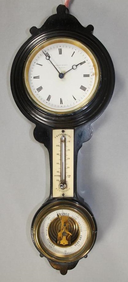 A VICTORIAN EBONISED WALL CLOCK with barometer Image