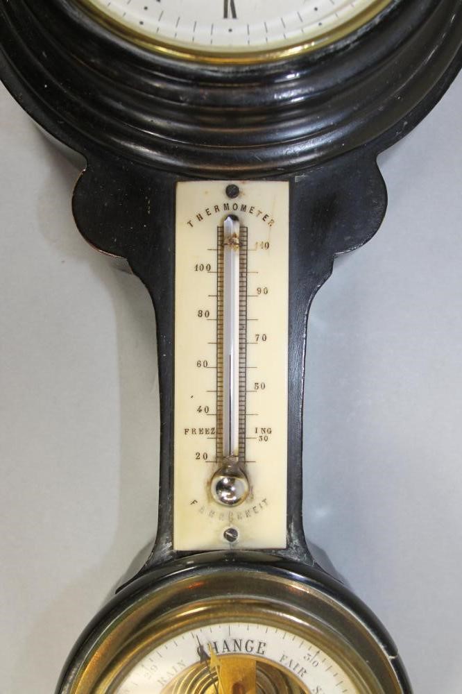 A VICTORIAN EBONISED WALL CLOCK with barometer Image
