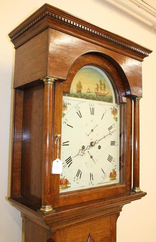 AN OAK LONGCASE CLOCK Image