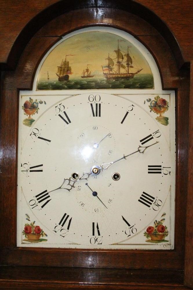 AN OAK LONGCASE CLOCK Image