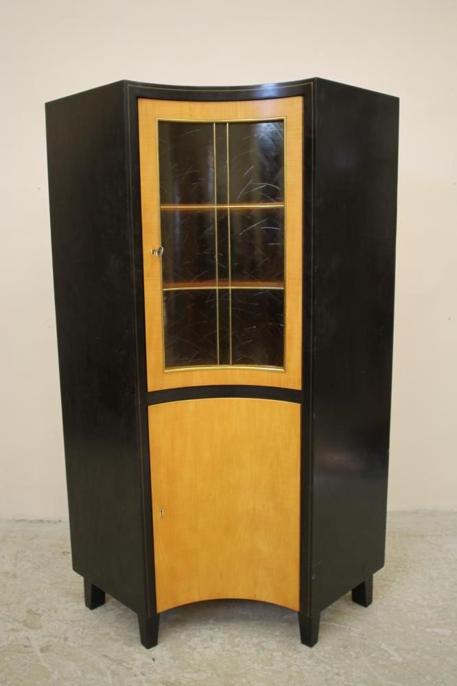 A SATINWOOD AND EBONISED DISPLAY CABINET by Muster Mobler Image