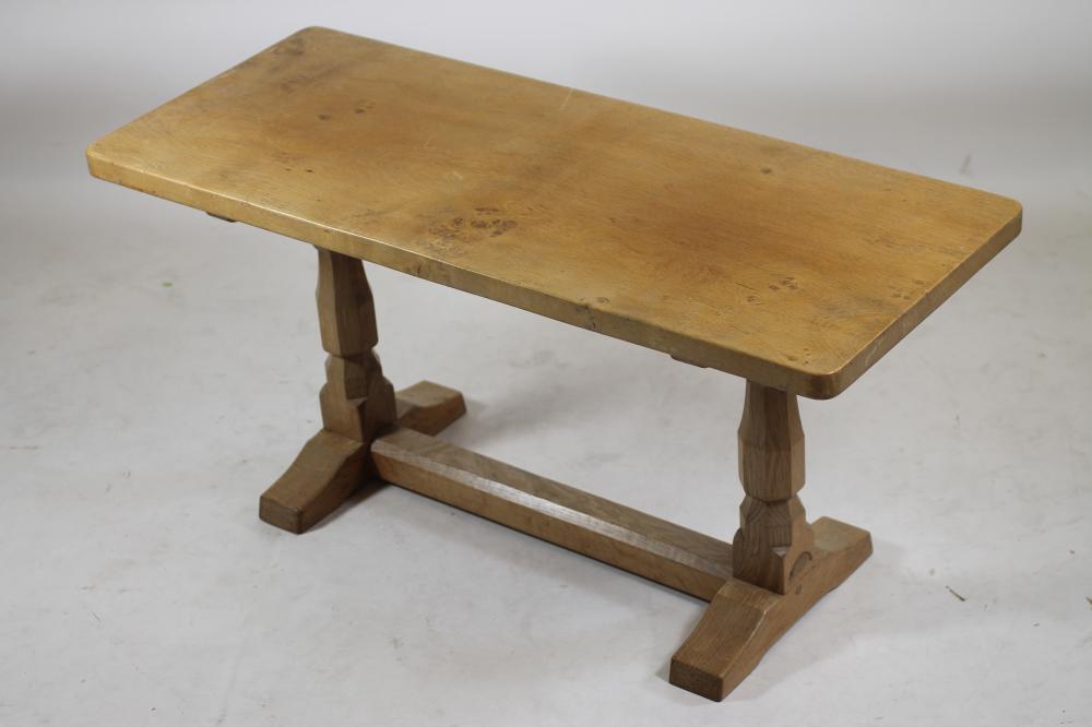 AN ADZED OAK COFFEE TABLE by Nick Hill of Colburn Image