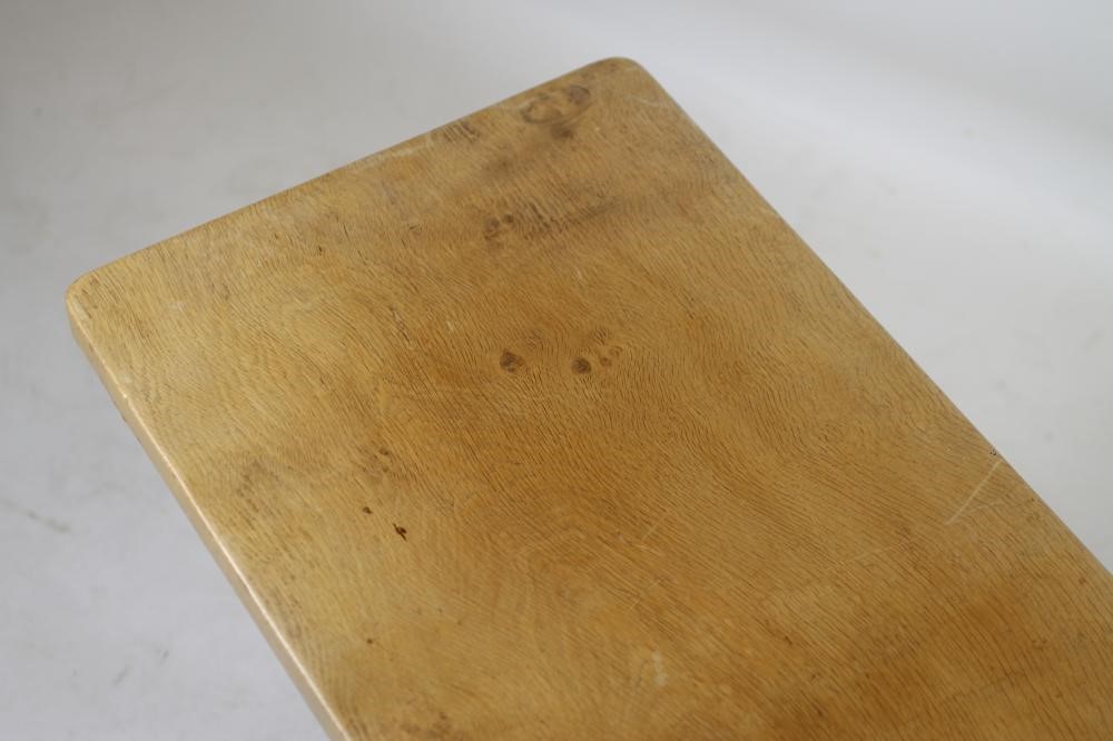 AN ADZED OAK COFFEE TABLE by Nick Hill of Colburn Image