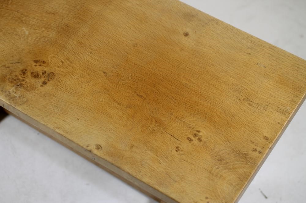 AN ADZED OAK COFFEE TABLE by Nick Hill of Colburn Image