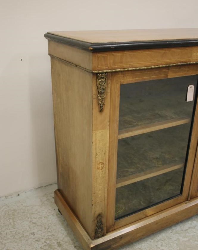 A VICTORIAN WALNUT AND EBONISED SIDE CABINET Image