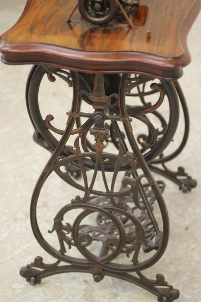 A VICTORIAN SEWING MACHINE by Willcox & Gibbs Image