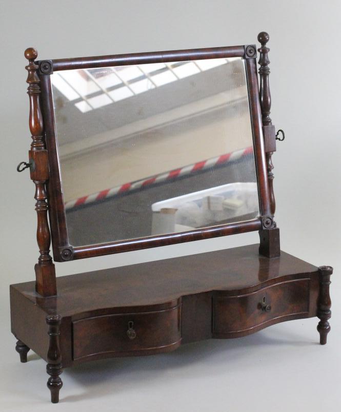 A WILLIAM IV MAHOGANY TOILET MIRROR Image