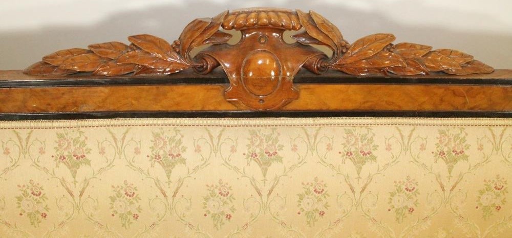 A VICTORIAN WALNUT AND EBONISED PART SALON SUITE upholstered in cream floral silk weave Image