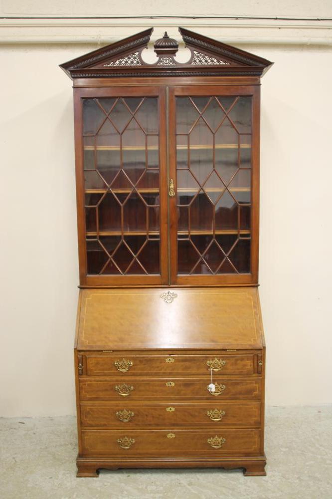 A GEORGIAN STYLE MAHOGANY AND STRING INLAID BUREAU BOOKCASE Image