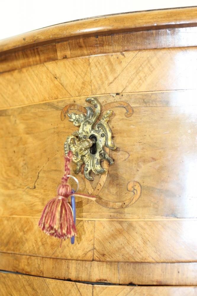 A WALNUT PETITE COMMODE Image