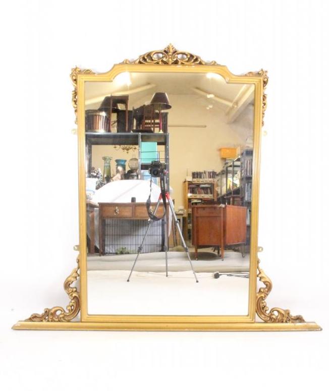A VICTORIAN CARVED GILT WOOD OVERMANTEL MIRROR Image