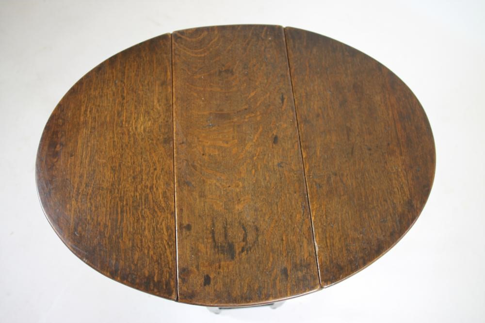 A SMALL OAK GATELEG TABLE Image