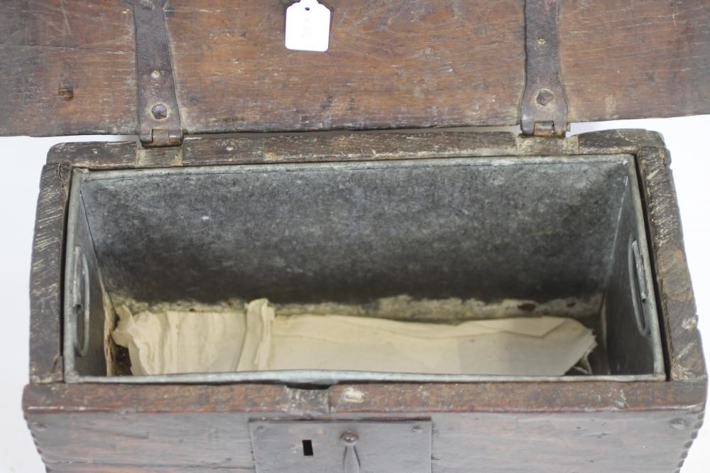 A MINIATURE OAK BOARDED CHEST Image