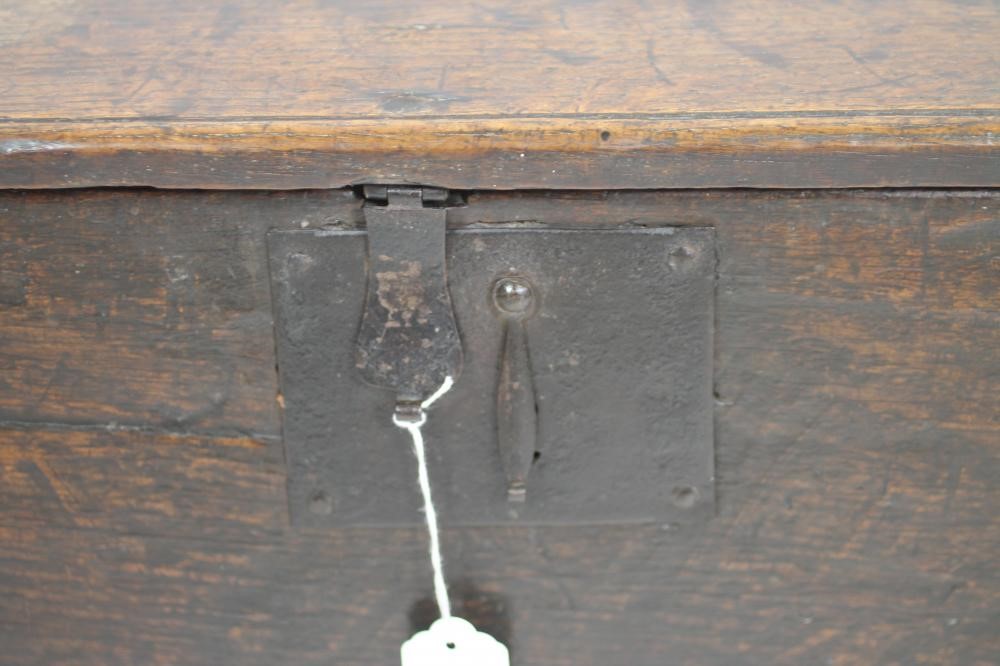 A MINIATURE OAK BOARDED CHEST Image