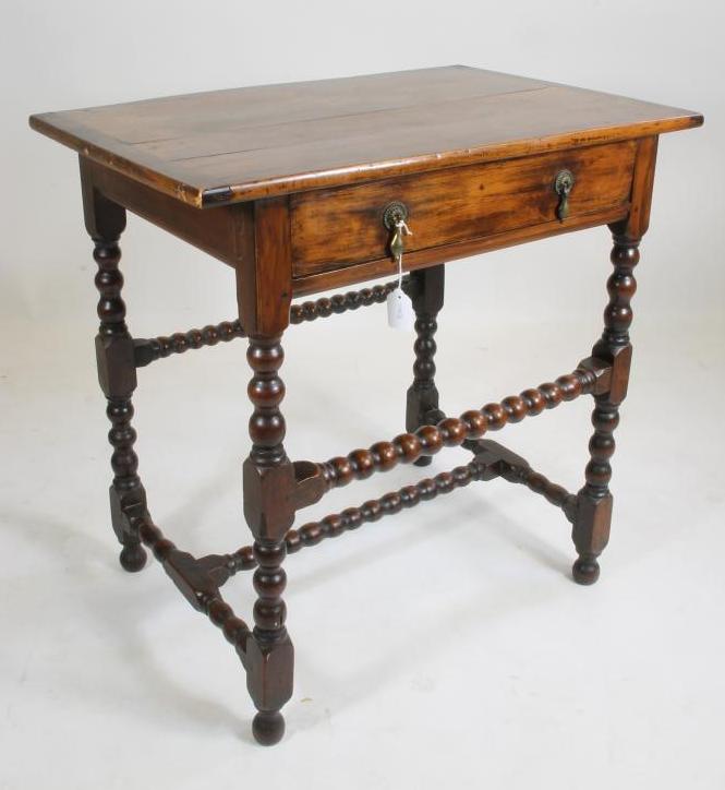A CHARLES II FRUITWOOD SIDE TABLE Image