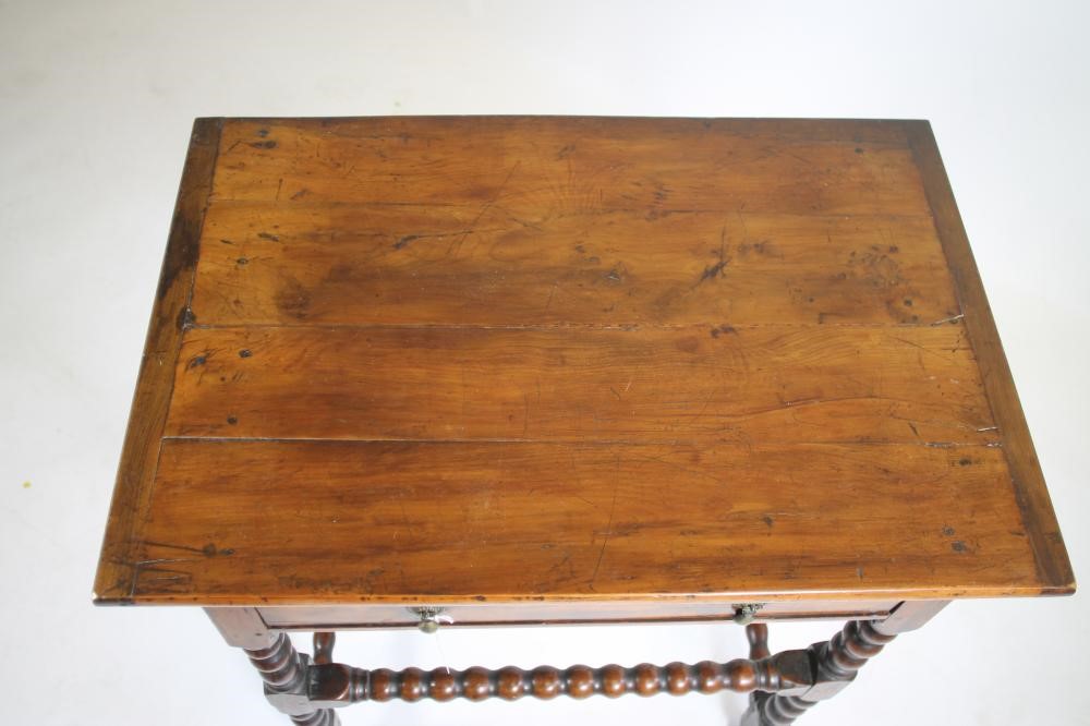 A CHARLES II FRUITWOOD SIDE TABLE Image