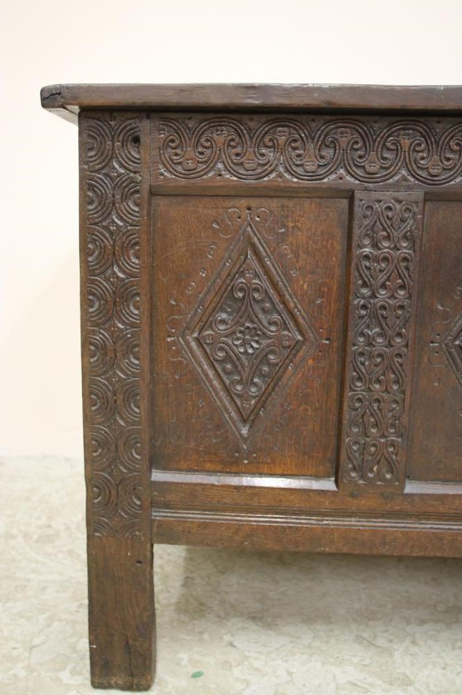 AN OAK PANELLED COFFER Image
