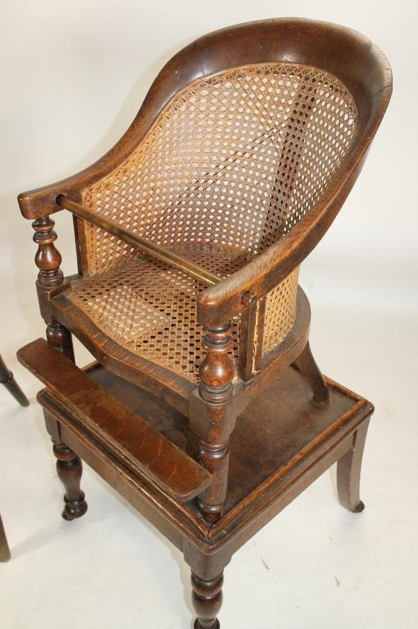 A CHILD'S EARLY VICTORIAN OAK HIGH CHAIR Image