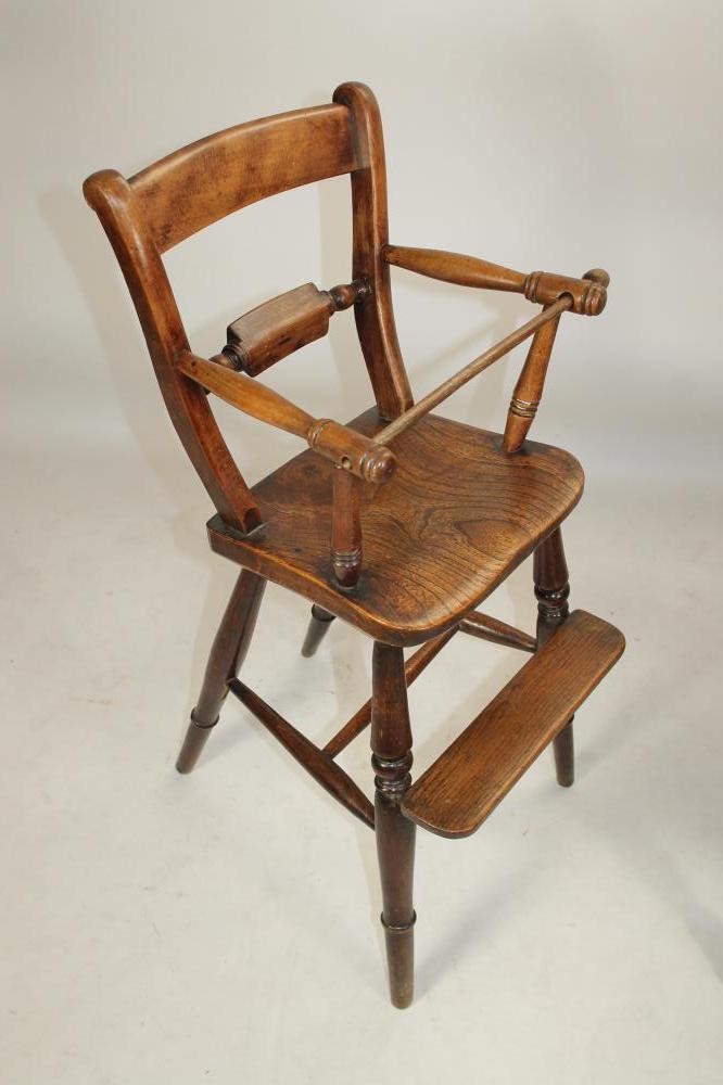 A CHILD'S EARLY VICTORIAN OAK HIGH CHAIR Image