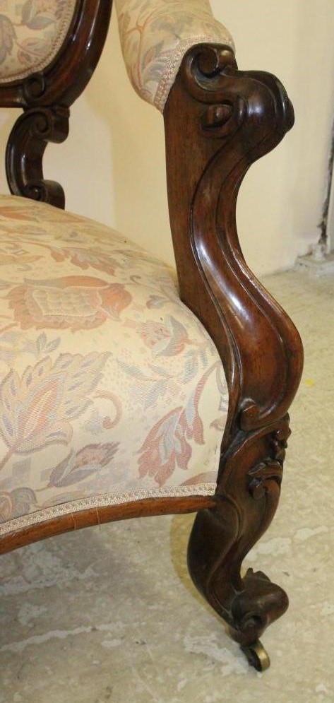 A VICTORIAN WALNUT CHAIRBACK SOFA Image