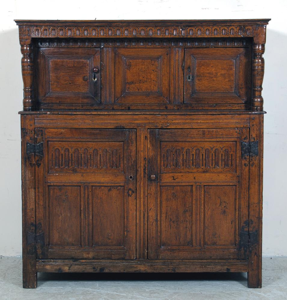 AN OAK PRESS CUPBOARD Image