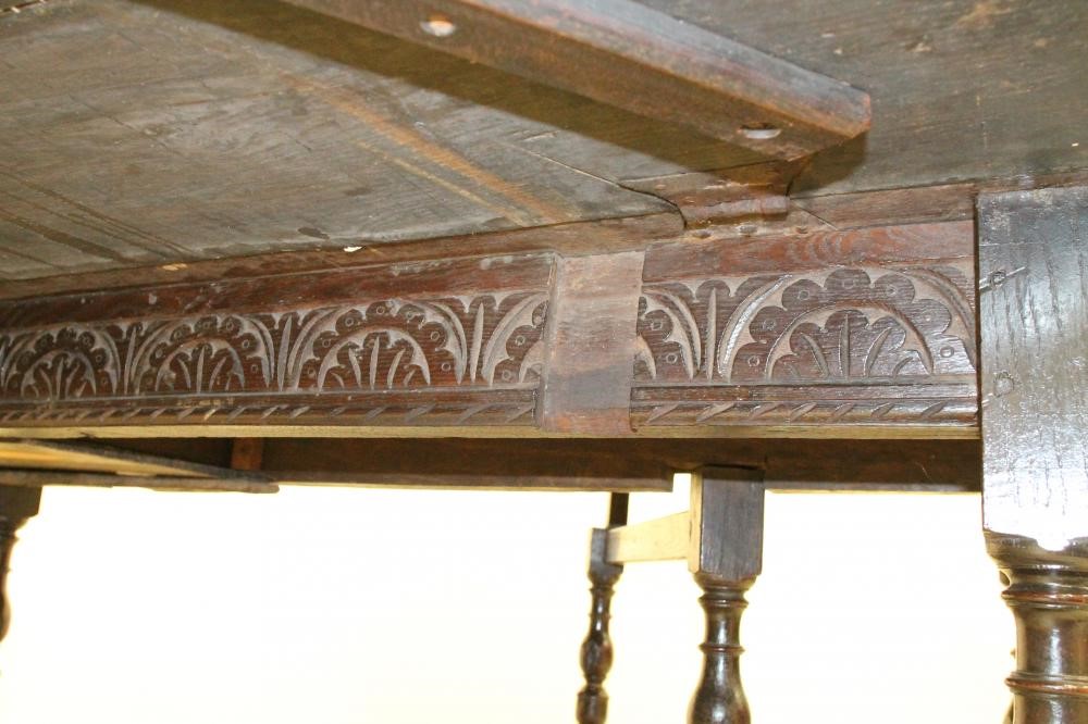 AN OAK GATELEG TABLE Image