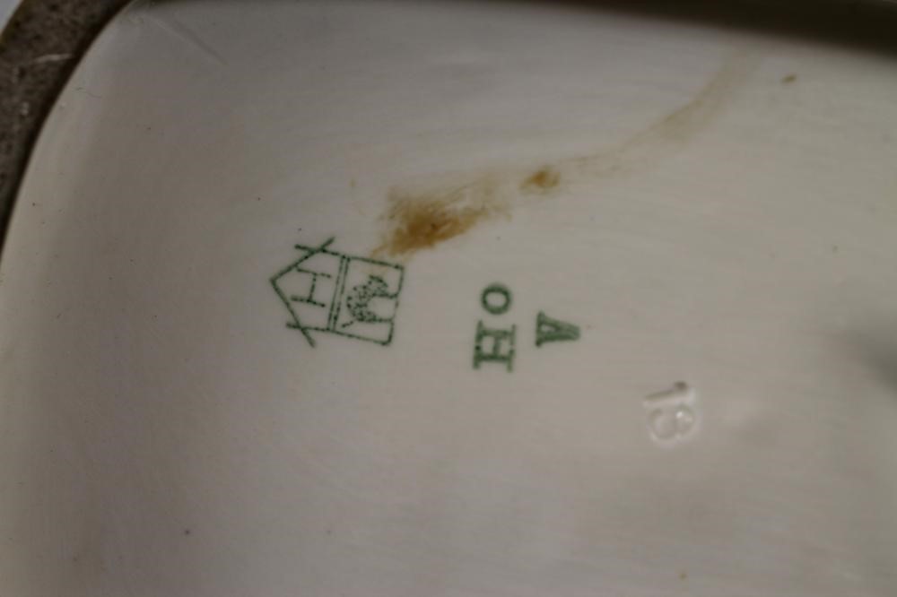 AN ART DECO KATZHUTTE EARTHENWARE FIGURE modelled as a stylish young lady wearing a hat and blue Image