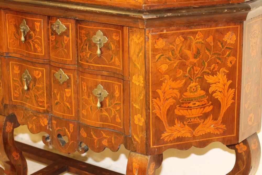 A DUTCH WALNUT AND FLORAL MARQUETRY DISPLAY CABINET ON STAND of canted shallow form Image