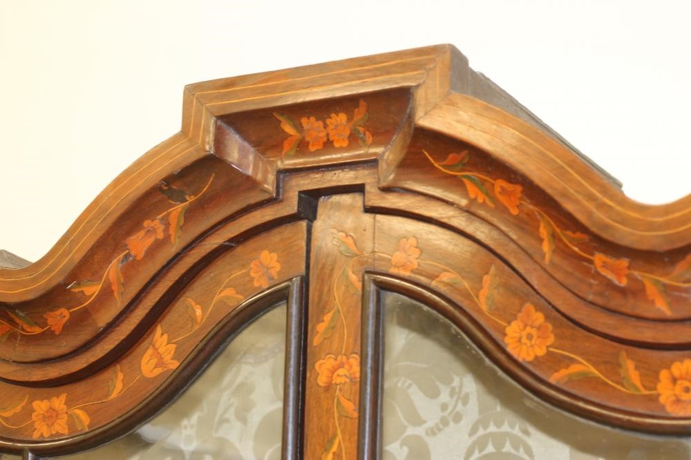 A DUTCH WALNUT AND FLORAL MARQUETRY DISPLAY CABINET ON STAND of canted shallow form Image