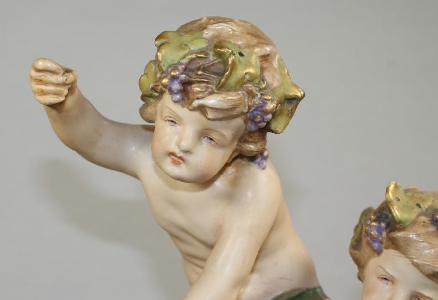 AN AMPHORA BISQUE PORCELAIN FIGURE GROUP Image