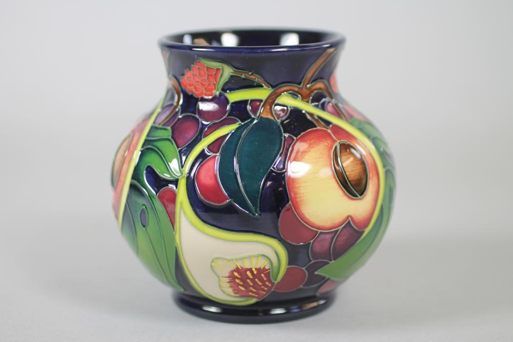 A MOORCROFT POTTERY VASE Image