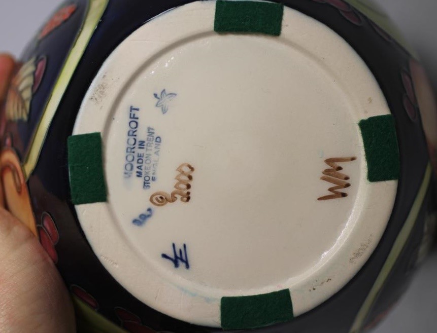 A MOORCROFT POTTERY JAR AND COVER Image