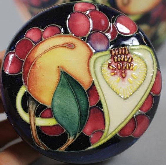 A MOORCROFT POTTERY JAR AND COVER Image