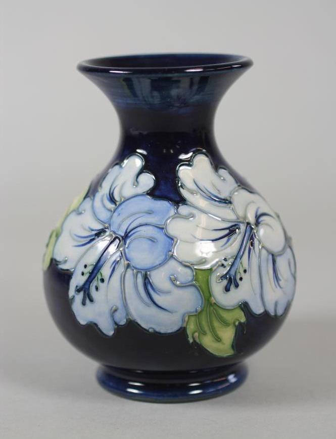 A MOORCROFT POTTERY VASE Image