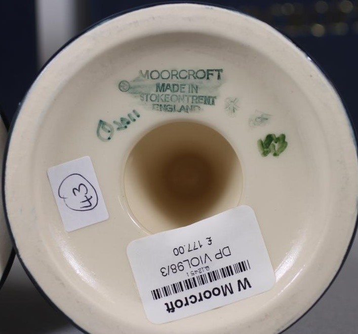 A PAIR OF MOORCROFT POTTERY DWARF CANDLESTICKS Image