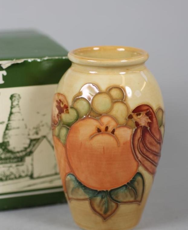 A MOORCROFT POTTERY SMALL VASE Image