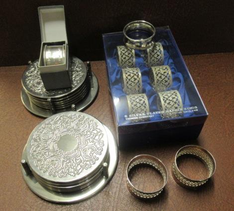 QUANTITY OF COASTERS AND NAPKIN RINGS INCLUDING SILVER Image