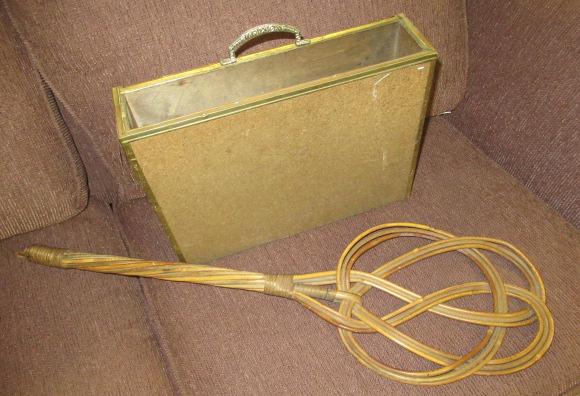 BRASS MAGAZINE RACK AND A CARPET BEATER Image