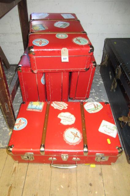 SET OF FIVE RED SUITCASES Image