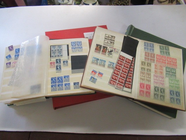 FOUR ALBUMS OF MINT AND USED BRITISH STAMPS Image