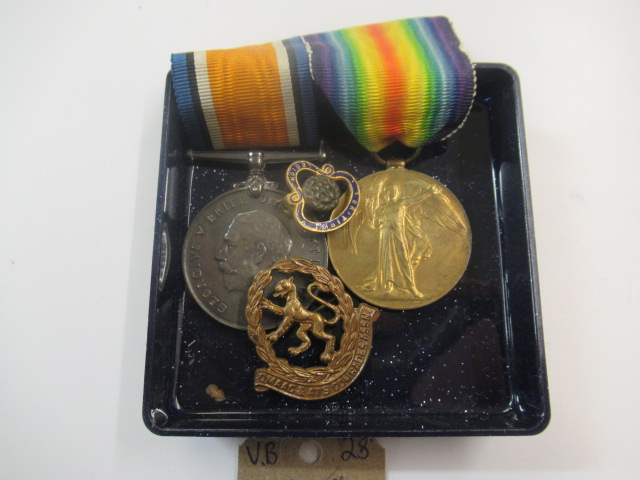 VICTORY AND WWI MEDAL TO A LADY G MURDOCH OF THE QUEEN MARYS ARMY AUX CORPS AND A VETERANS BADGE Image